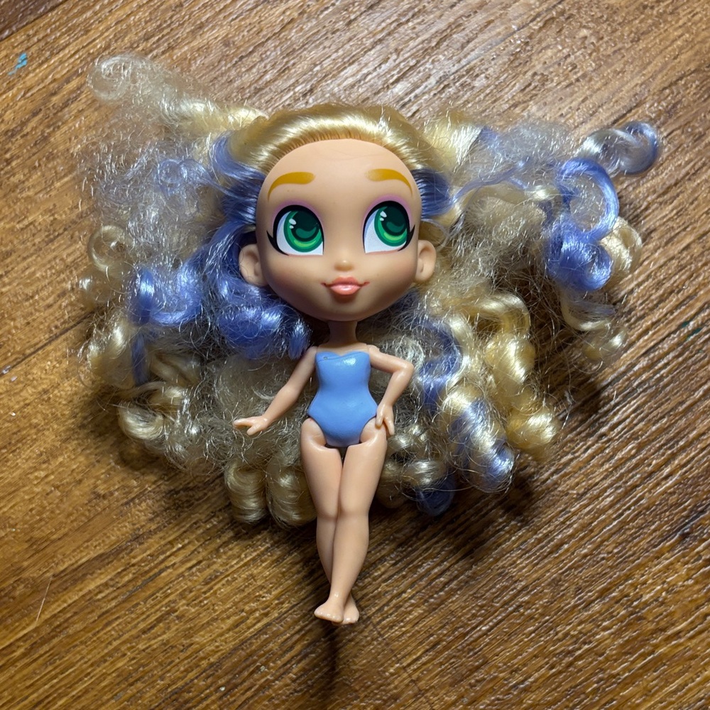 Disney HairDorables Purple and Blone doll
